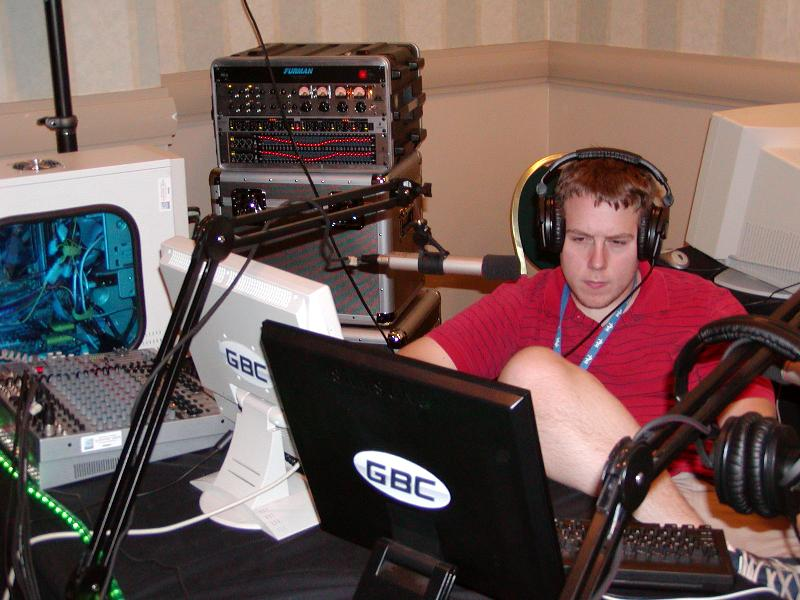 st1ckg0d broadcasting from the GBC Radio station at a LAN event
