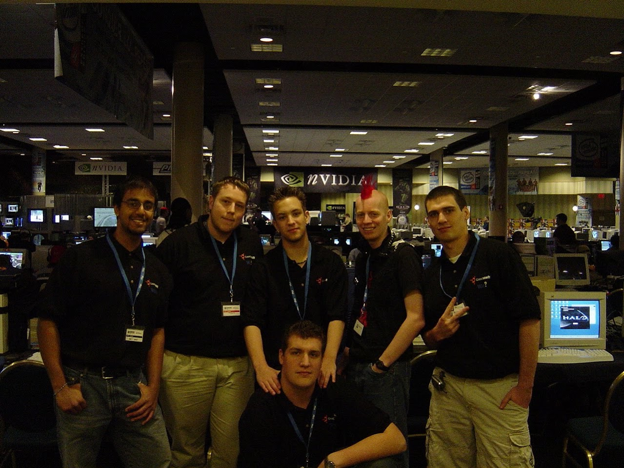 Team Wat¿ together at CPL Winter 2003 with Halo computers behind them